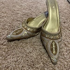 Le Chateau Gold Mules with Ornate Design